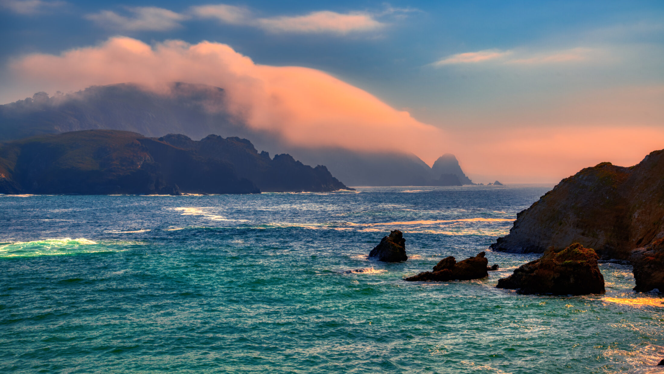 Pink Cloud Over the Galician Coast