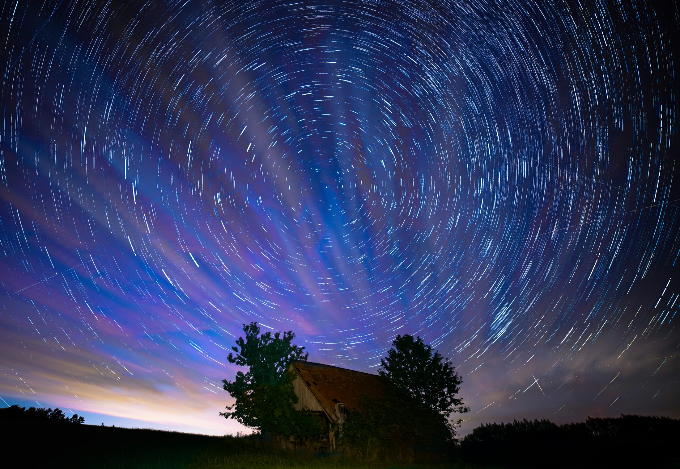 Star Trails Over Rustic Barn